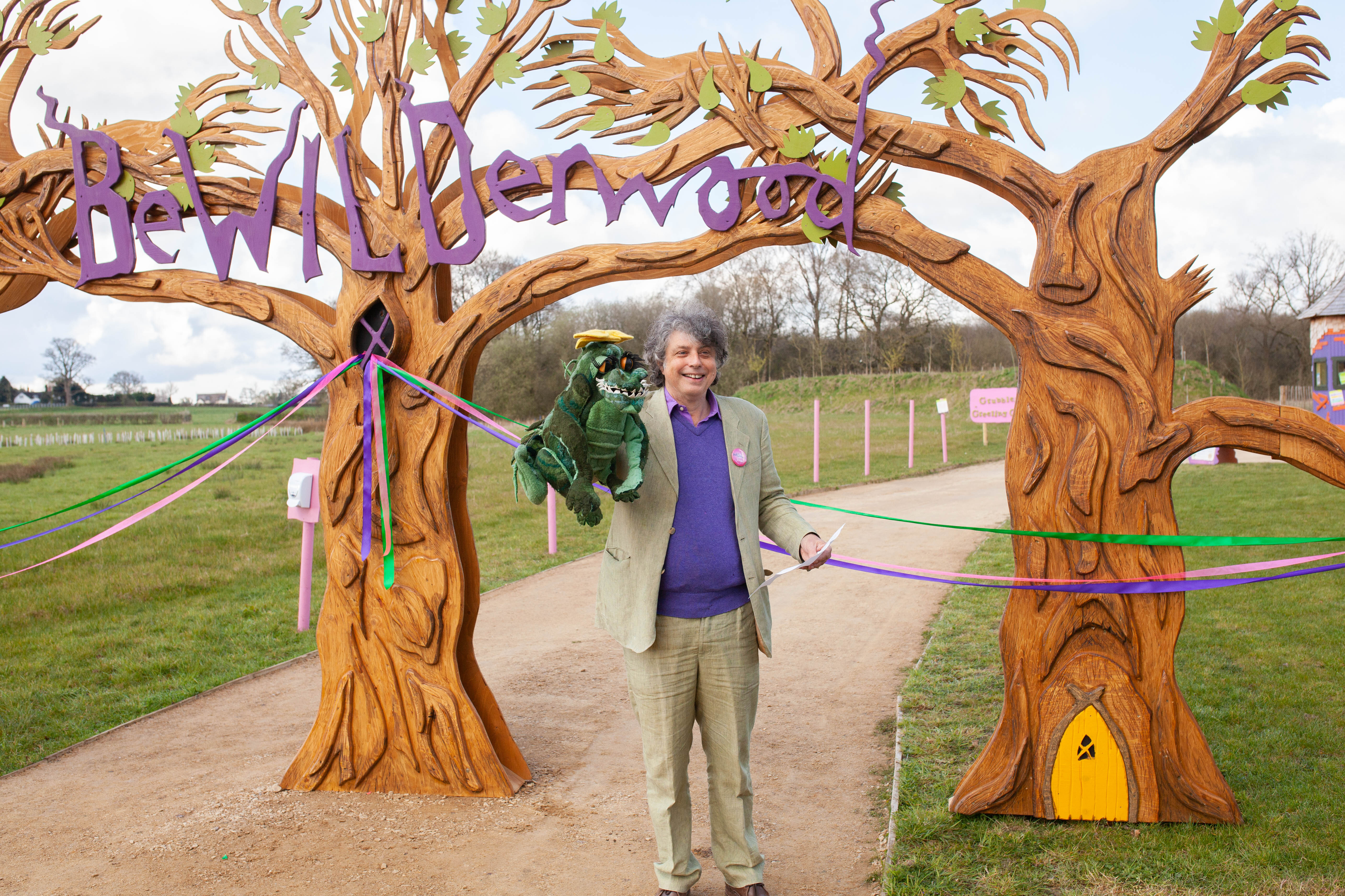 Tom Blofeld with Crocklebog puppet outside BeWILDerwood Cheshire