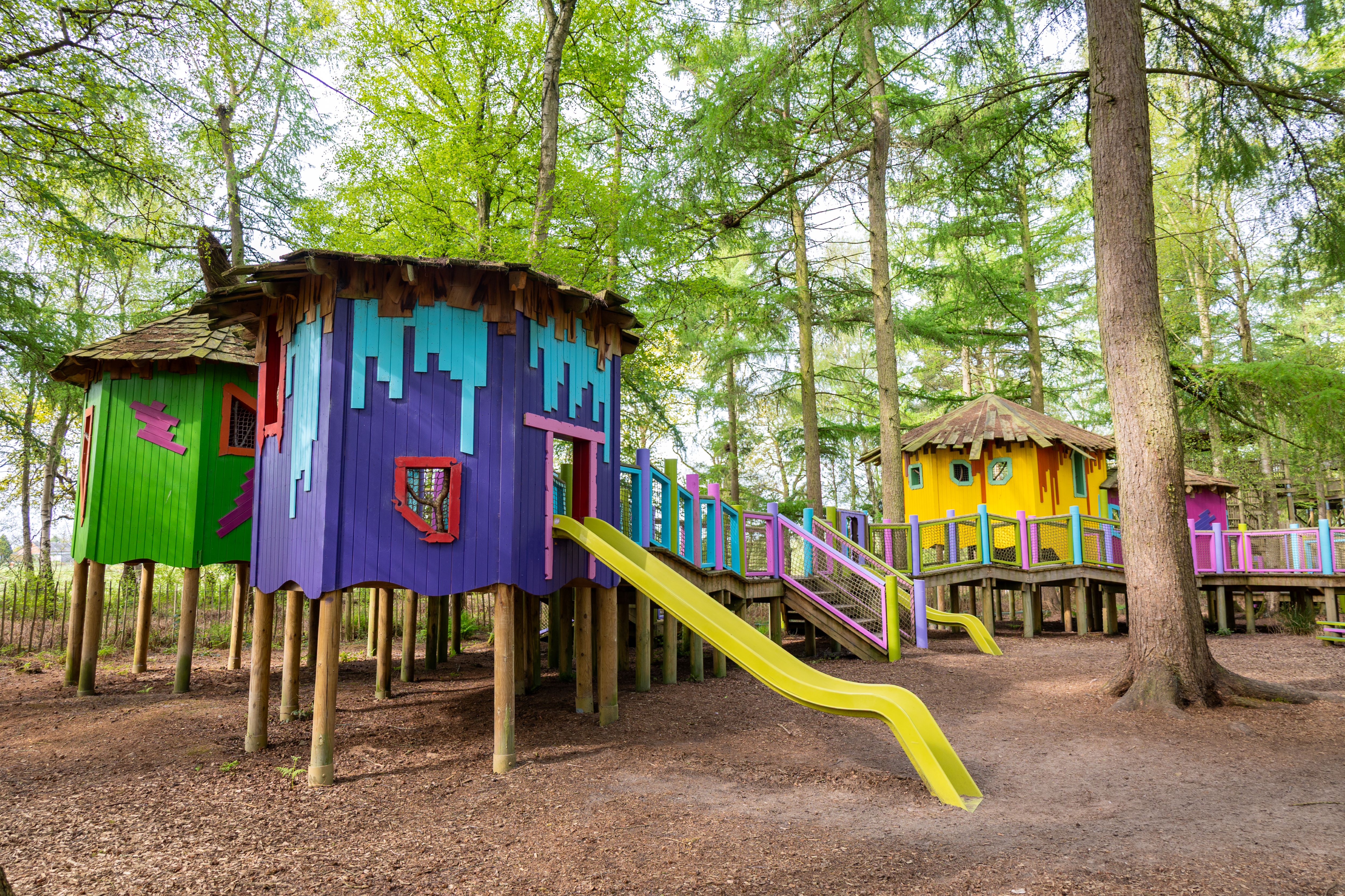 Colourful play structures at bewilderwood