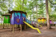 Colourful play structures at bewilderwood