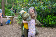 Toddler hugging a puppet at bewilderwood