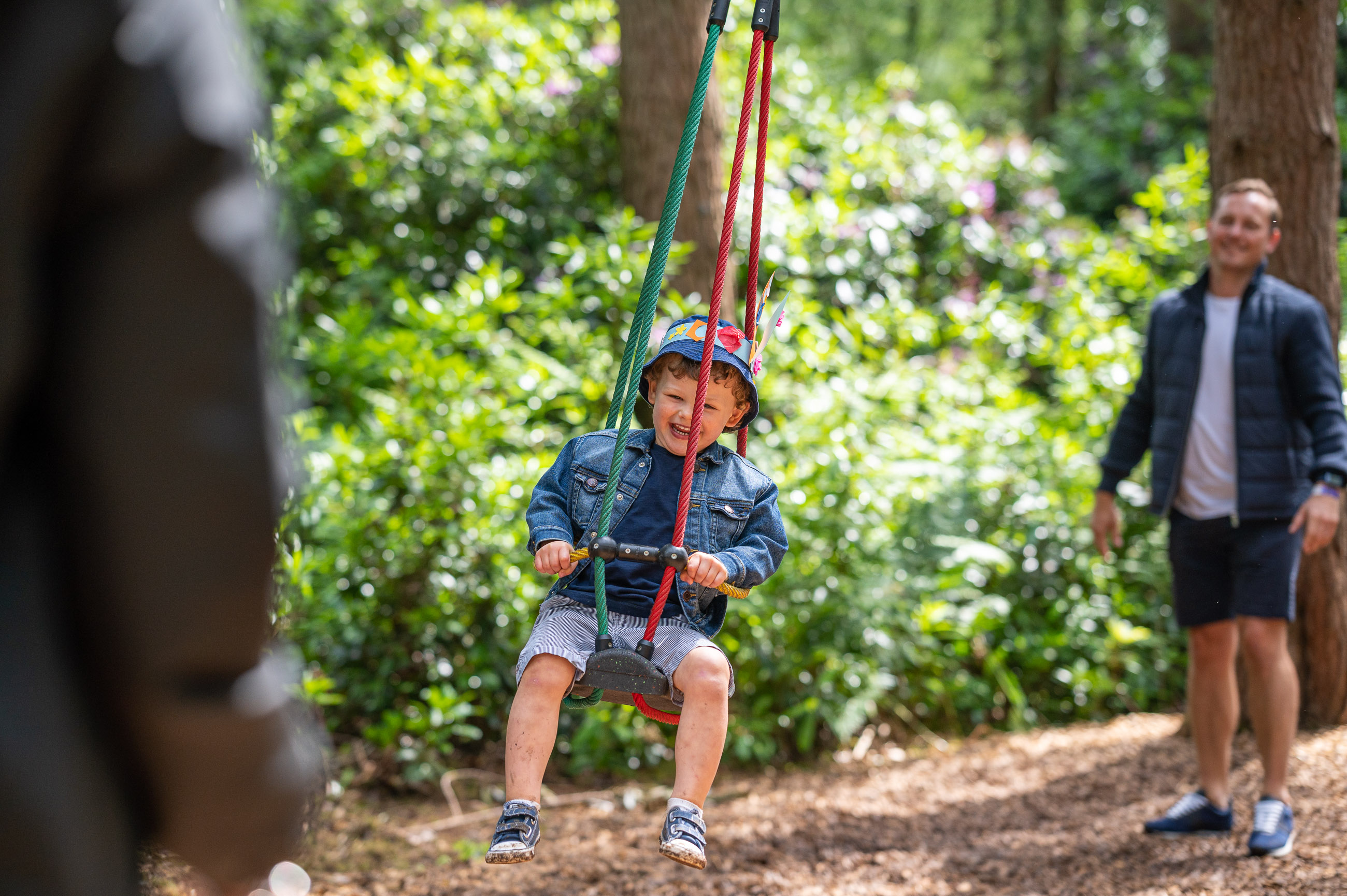 toddler on small zip line for toddlers