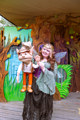 Staff member and puppet at stage