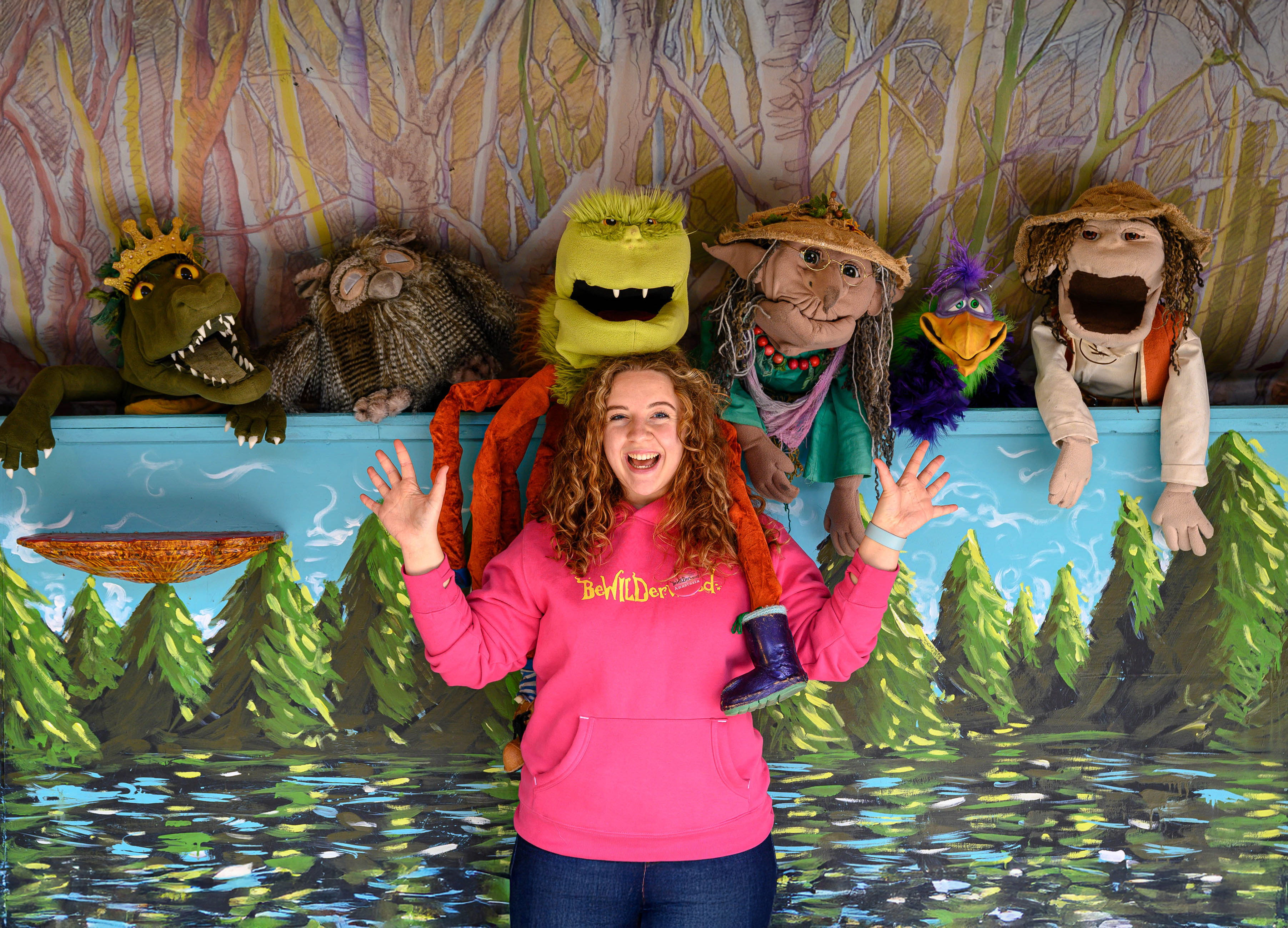 Bewilderwood staff memember with puppets
