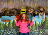 Bewilderwood staff memember with puppets