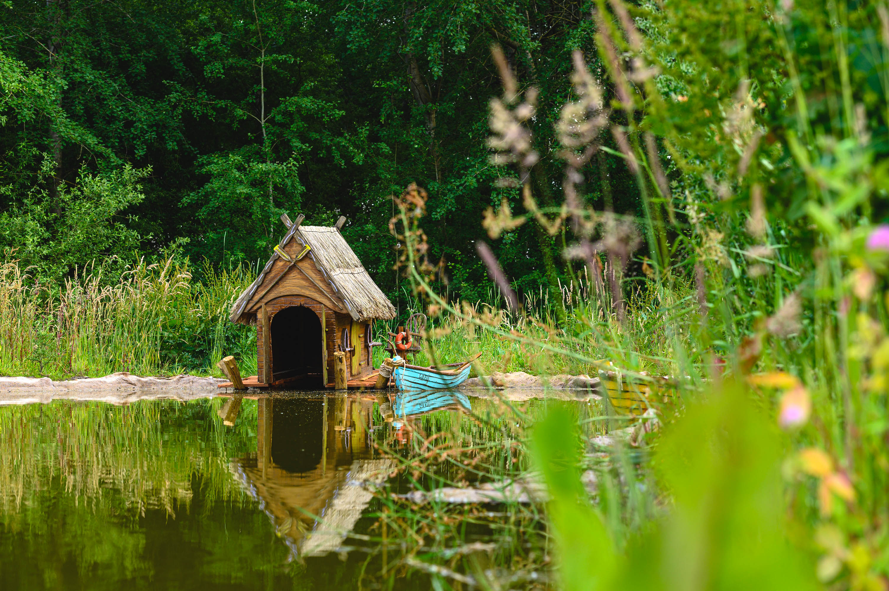 Wooden boat house at bewilderwood